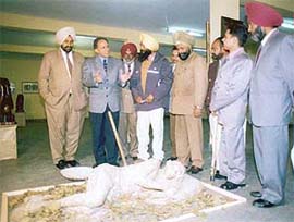 Parveen Kumar and Jaswinder Singh Mehndipur exhibit their paintings and sculptures at Nehru Sidhant Kendra in Ludhiana on Wednesday