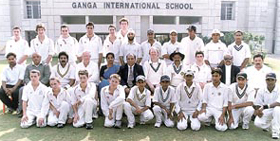 Veterans Club team captain Chetan Chauhan and Ganga School principal Mrs H. Sraw with the Hurstpierpoint College team when they played a limited-over match 