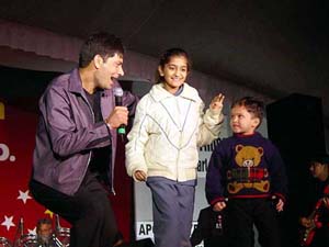 Punjabi pop singer Jassi performs during a stage show