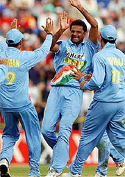 India's Javagal Srinath celebrates the wicket of New Zealand's Craig McMillan