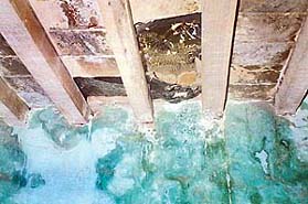 A hole in the roof of lock-up room inside the police post in Laddowal village from where two burglars escaped 