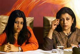 Film director Aparna Sen gestures during a news conference