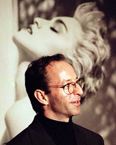 Fashion photographer Herb Ritts, who is seen in front of his portrait of Madonna at Boston�s Museum of Fine Arts in this file photograph