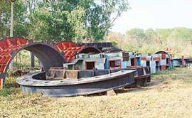 Machinery and equipment worth crores of rupees of the Anandpur Sahib hydel project lie in the open at Malakpur