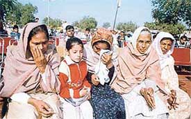 Kargil widows break into tears at a function organised to honour them in Mullanpur village
