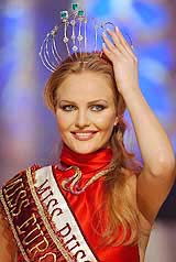 Miss Russia Svetlana Koroleva adjusts her crown after winning the Miss Europe 2002 title in Beirut on Sunday