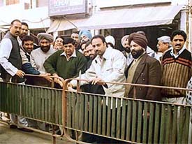 Mr Nahar Singh Gill, city Mayor, and Mr Surinder Dawar, MLA, at a function to mark commencement of work to provide sodium lights on the jail road