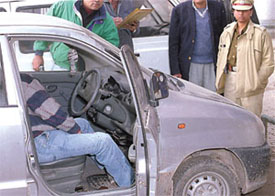 The body of Raman Katyal, who had allegedly killed three business partners of his brother in Rohtak on Wednesday, which was found in a Santro car