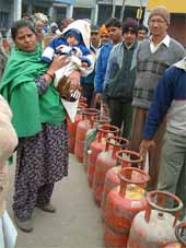 Bathinda residents wait for their turn at an LPG distribution agency on Friday. 