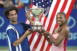 The USA's James Blake and Serena Williams hold the Hopman Cup trophy after their victory in the men's and women's singles 