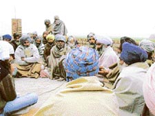 The soon to be displaced villagers of the Bet area chalk out the future course of action