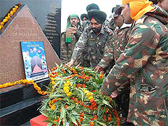 Army personnel pay tributes on the first death anniversary of the mine blast victims