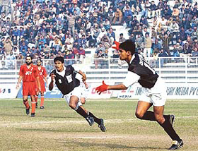 Dependu Biswas and Rahim Naloi of Mohammedan Sporting Club celebrate after scoring against JCT 