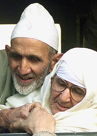 An elderly Kashmiri couple going for Haj pilgrimage