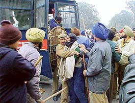 Activists of the Central Trade Union of Chandigarh who were arrested by the police at the  Tribune Chowk 
