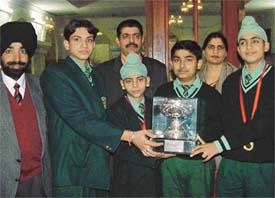 Students of Green Land School in a jubilant mood after winning the CBSE national championship in badminton