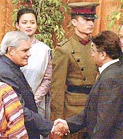 Prime Minister A. B. Vajpayee shakes hands with Pakistan President