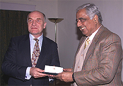 Jammu and Kashmir Chief Minister Mufti Mohammed Syed receives a gift