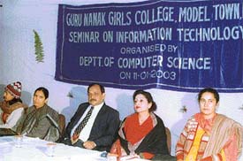 Speakers at a seminar on information technology in Guru Nanak Girls College