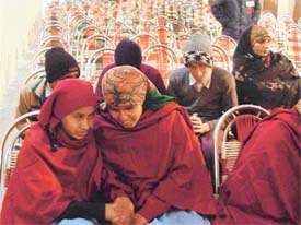 Visually challenged students wait for the competitions to begin at the second inter-state annual competition for the blind