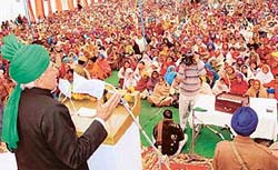 Haryana Chief Minister Om Prakash Chautala addresses a conference of women workers of the Indian National Lok Dal