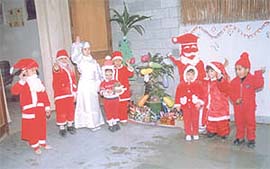 Children dressed up as Mother Mary and Santa Claus
