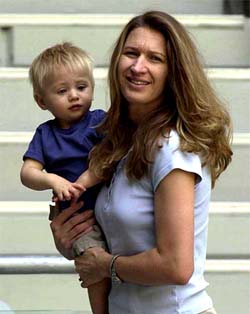 Steffi Graf, wife of Andre Agassi, carries their son Jaden Gil