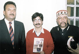 Statistician Rajneesh Gupta, flanked by former Test stars Madan Lal and Syed Kirmani, at his book launch function