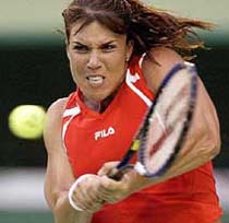 American Jennifer Capriati hits a backhand return