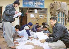 Subscribers collect their telephone bills