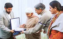 Former Adviser to the Administrator, UT, Neeru Nanda being presented a memento 