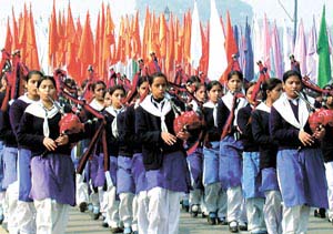 Schoolchildren during the Republic Day parade rehearsal at Rajpath in the Capital on Tuesday.