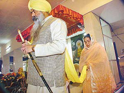 A former Akal Takht Jathedar, Bhai Ranjit Singh, and his bride Gurpreet Kaur at their Anand Karaj at Gurdwara Damdama Sahib 