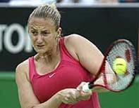 Mary Pierce of France returns a shot to Patricia Wartusch of Austria 