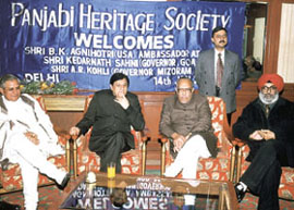 Mr A.R. Kohli, Mizoram Governor, Mr B.K. Agnihotri, Ambassador at Large, USA, Mr Kedarnath Sahni, Goa Governor and Mr Virender Singh Jauhar, President of Panjabi Heritage Society at the Lohri celebrations 