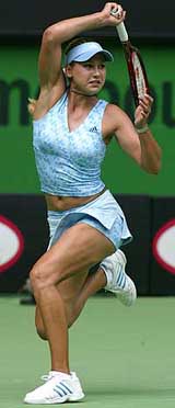 Russia's Anna Kournikova hits a forehand
