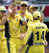 Australian paceman Brett Lee celebrates with catcher Ricky Ponting