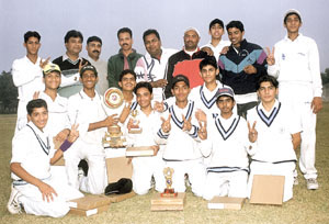 The DLDAV School team with the Aryavrat cricket trophy