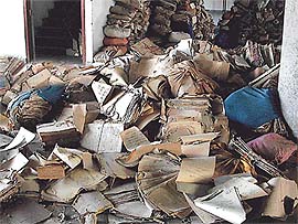 Archive record files lay scattered after being shifted to the Language Department from the State Archive building in Patiala