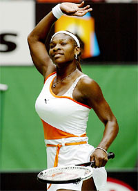 Serena Williams of the USA celebrates after winning her second round match against Els Callens of Belgium