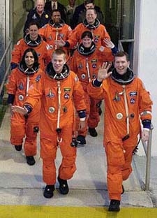 The space shuttle Columbia crew departs their quarters for the launch at the Kennedy Space Center in Cape Canaveral 