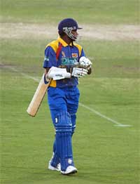 Sri Lankan batsman Sanath Jayasuriya looks back towards his partner