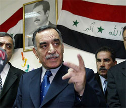 General Hussam Mohammed Amin, Head of Iraq's National Monitoring Directorate, speaks to the media