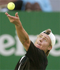 Lleyton Hewitt of Australia serves to Radek Stepanek of the Czech Republic during their match
