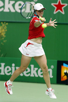 Kim Clijsters from Belgium hits a forehand