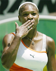 Serena Williams from the United States blows kisses to the crowd