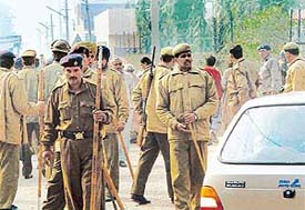 Policemen on their toes managing unruly supporters of candidates