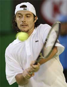 Sebastien Grosjean from France hits a backhand