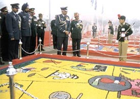 Air Chief Marshal Krishnaswamy, PVSM, AVSM, YM, ADC, Chief of the Air Staff, being briefed by an NCC cadet 