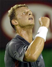 David Nalbandian of Argentina celebrates a point in his win over Roger Federer of Switzerland 